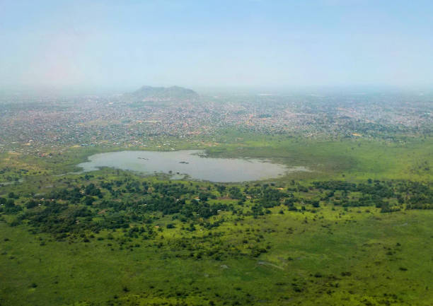 Juba, South Sudan: Africa's newest capital seen from the air - lake and mountain - White Nile in the background