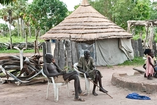 Rumbek, South Sudan - September 4, 2009: Two farmers by Tukol in South Sudan. Many experts say Southern Sudan should be able to feed itself. The region encompasses vast amounts of arable land, but decades of fighting prevented the agricultural sector from developing.