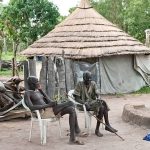 Rumbek, South Sudan - September 4, 2009: Two farmers by Tukol in South Sudan. Many experts say Southern Sudan should be able to feed itself. The region encompasses vast amounts of arable land, but decades of fighting prevented the agricultural sector from developing.